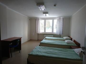 Фото номера Трехместный номер с общей ванной комнатой Комплексы для отдыха с коттеджами/бунгало Centrum Turystyczno- Rehabilitacyjne г. Krzyżewo 4